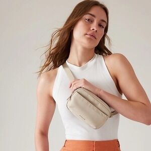 Athleta Crossbody Bag Tan Nylon Adjustable Strap Zip Pockets Small Pouch